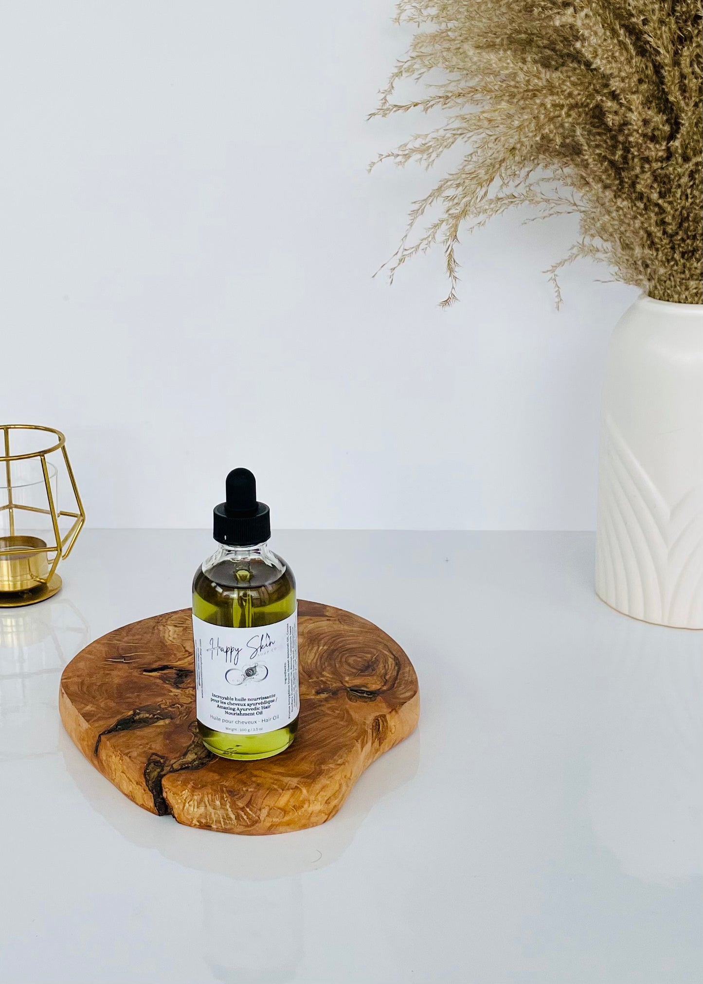 bottle with its rich, deep color derived from natural and nourishing ingredients. A large-sized bottle of the product is prominently displayed